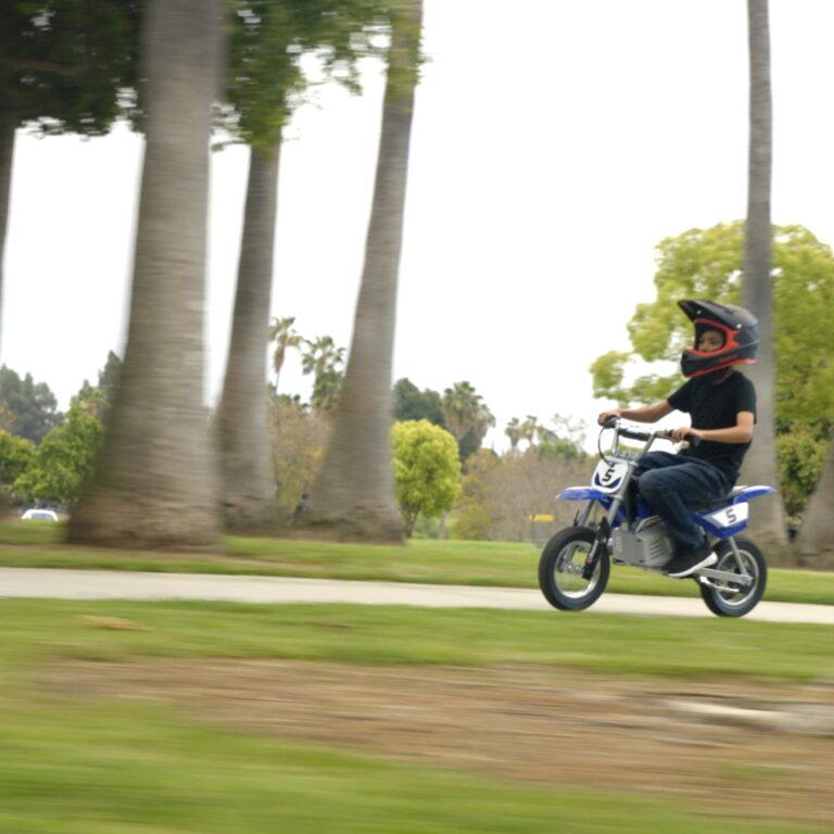 Razor MX350 Dirt Rocket Electric Motocross Off-Road Bike for Age 13+, Up to 30 Minutes Continuous Ride Time, 12" Air-Filled Tires, Hand-Operated Rear Brake, Twist Grip Throttle, Chain-Driven Motor - Image 4