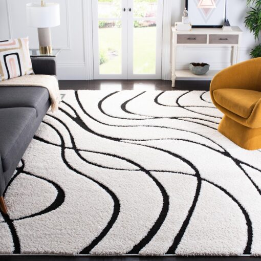 SAFAVIEH Florida Shag Collection Area Rug - 8'6" x 12', Ivory & Black, Non-Shedding & Easy Care, 1.2-inch Thick Ideal for High Traffic Areas in Living Room, Bedroom (SG471-1290)