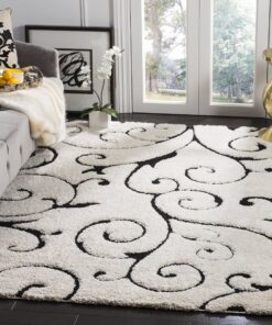 SAFAVIEH Florida Shag Collection Area Rug - 6' x 9', Ivory & Black, Scroll Design, Non-Shedding & Easy Care, 1.2-inch Thick Ideal for High Traffic Areas in Living Room, Bedroom (SG455-1290)