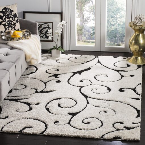 SAFAVIEH Florida Shag Collection Area Rug - 6' x 9', Ivory & Black, Scroll Design, Non-Shedding & Easy Care, 1.2-inch Thick Ideal for High Traffic Areas in Living Room, Bedroom (SG455-1290)