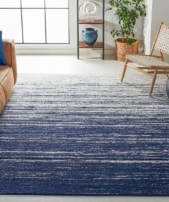 SAFAVIEH Adirondack Collection Area Rug - 9' x 12', Navy & Ivory, Modern Ombre Design, Non-Shedding & Easy Care, Ideal for High Traffic Areas in Living Room, Bedroom (ADR113N)