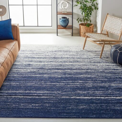 SAFAVIEH Adirondack Collection Area Rug - 9' x 12', Navy & Ivory, Modern Ombre Design, Non-Shedding & Easy Care, Ideal for High Traffic Areas in Living Room, Bedroom (ADR113N)