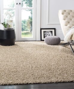 SAFAVIEH Athens Shag Collection Area Rug - 6' x 9', Beige, Non-Shedding & Easy Care, 1.5-inch Thick Ideal for High Traffic Areas in Living Room, Bedroom (SGA119G)